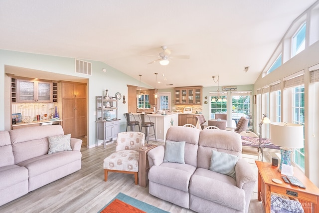 32208 G St, Ocean Park, WA 98640 - living room featuring vaulted ceiling, ceiling fan, and light hardwood / wood-style flooring