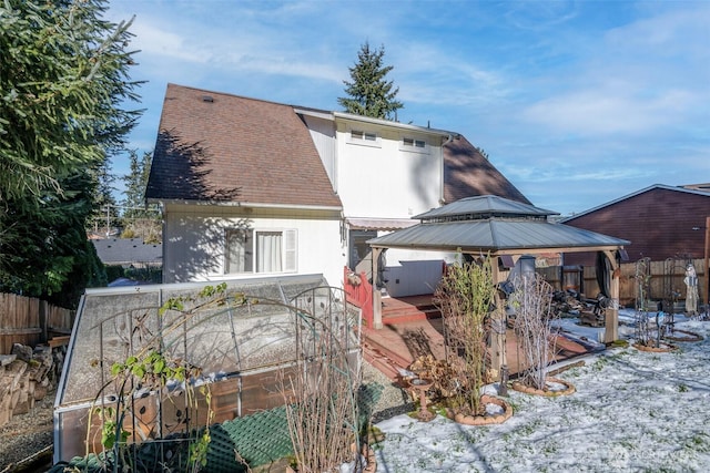 view of snowy exterior featuring a gazebo