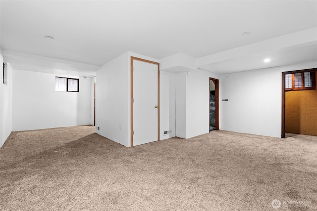 basement with carpet flooring