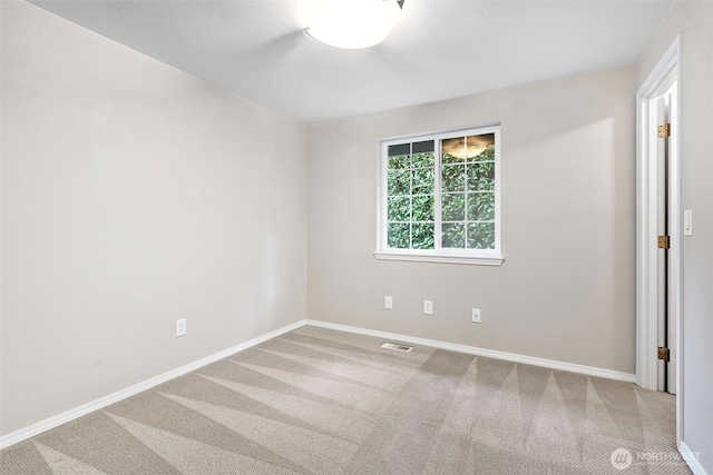 unfurnished room with carpet floors