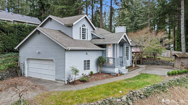 view of front of property featuring a garage