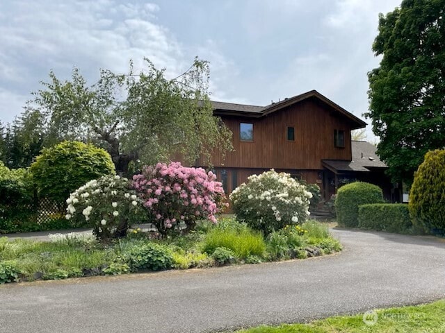 1090 Middle Fork Rd, Onalaska, WA 98570 - view of property exterior featuring an attached garage