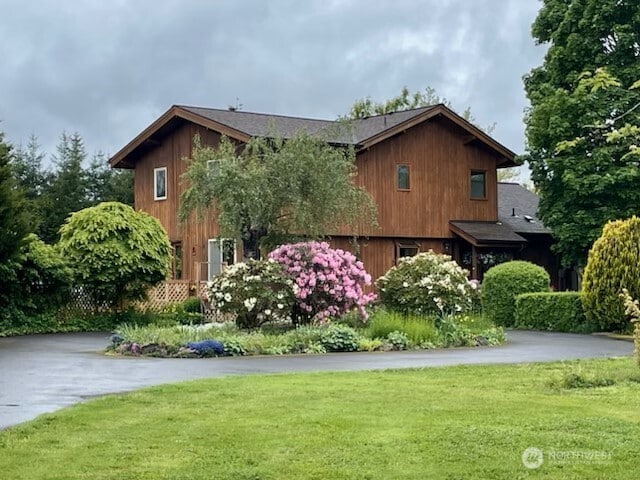 1090 Middle Fork Rd, Onalaska, WA 98570 - view of property exterior with a yard