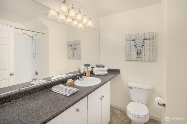 bathroom featuring toilet, baseboards, a notable chandelier, and vanity