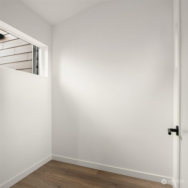 spare room featuring hardwood / wood-style flooring