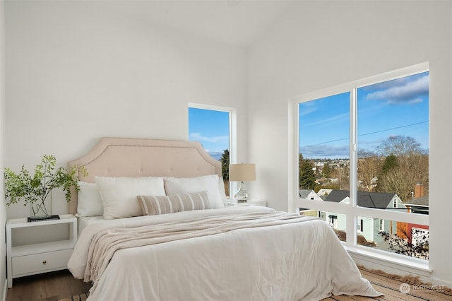 bedroom with hardwood / wood-style flooring