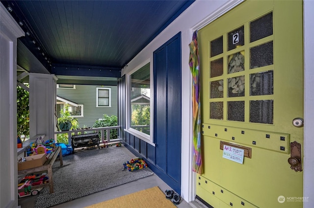 entrance to property with a porch