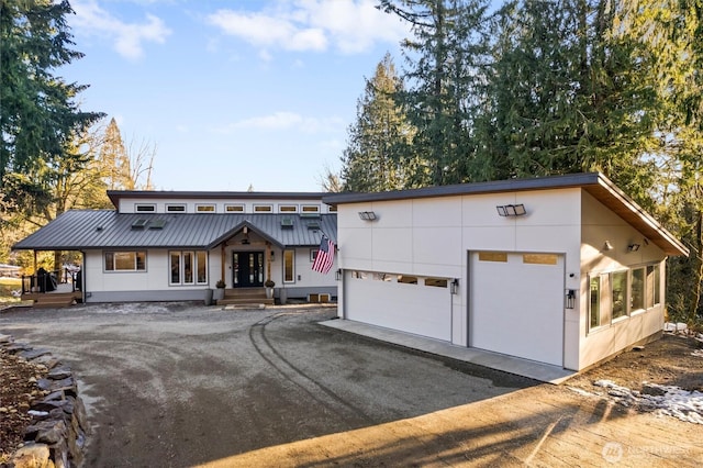 view of front of home with a garage