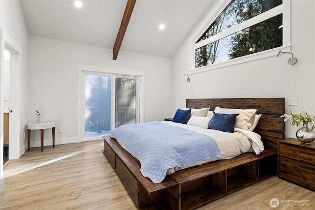 bedroom with access to exterior, lofted ceiling with beams, and light hardwood / wood-style floors