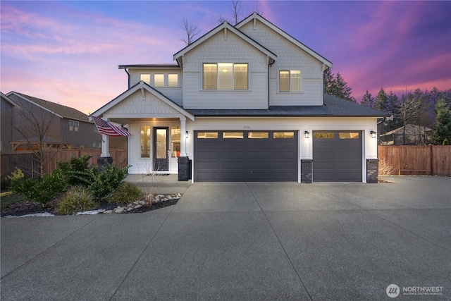 craftsman-style home with a porch and a garage