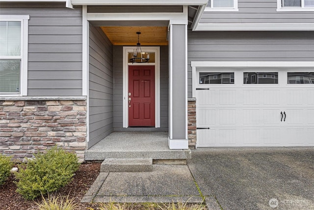 entrance to property with a garage