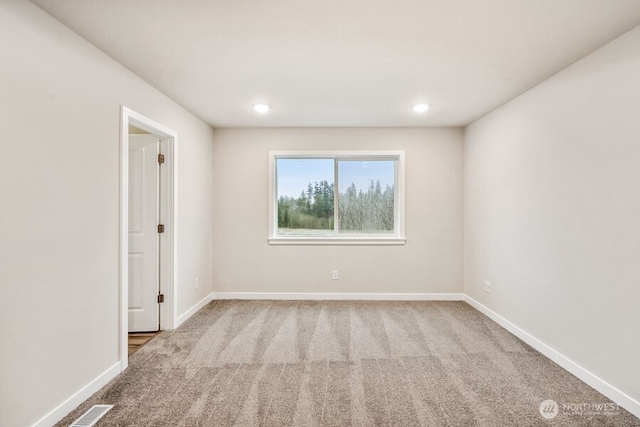 view of carpeted spare room