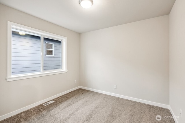 view of carpeted spare room