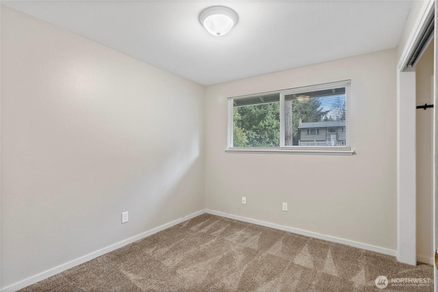 view of carpeted spare room