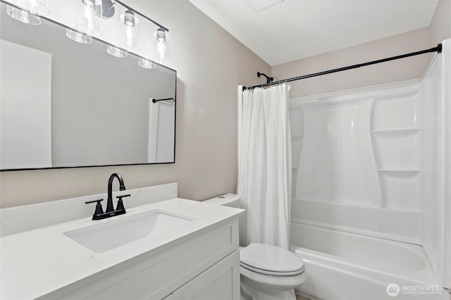 full bathroom with vanity, toilet, and shower / tub combo with curtain