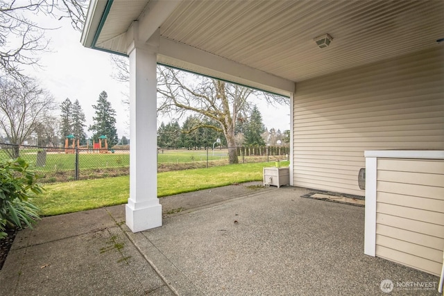 view of patio featuring a playground