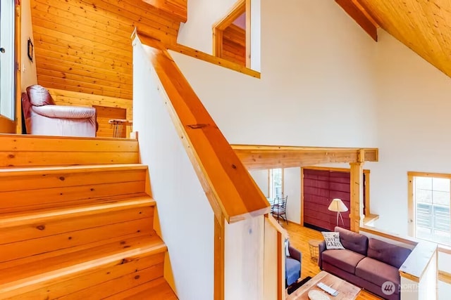 stairs featuring a high ceiling