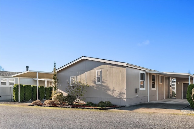 view of front of house with a carport