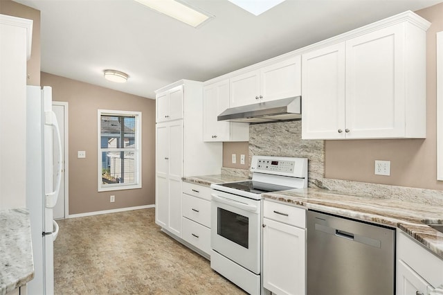 kitchen featuring white appliances, white cabinetry, tasteful backsplash, light stone countertops, and vaulted ceiling