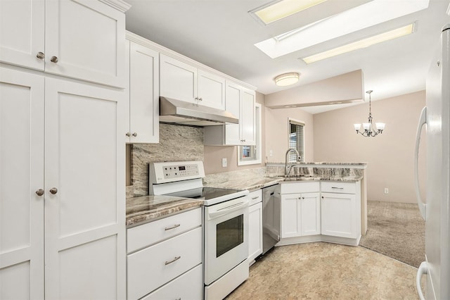 kitchen with sink, decorative light fixtures, white appliances, light stone countertops, and white cabinets