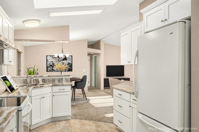 kitchen with lofted ceiling, sink, white cabinets, light stone counters, and white appliances