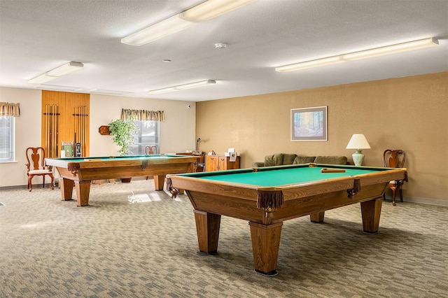 recreation room with pool table, carpet floors, and a textured ceiling