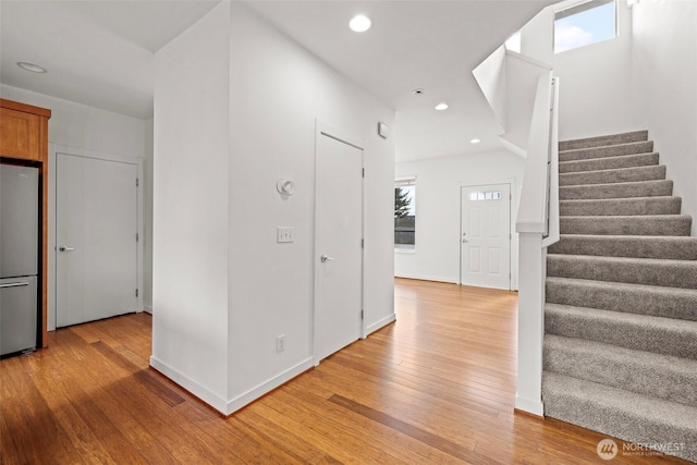 foyer with light wood-type flooring