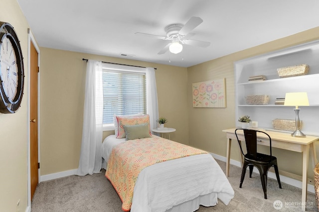 bedroom with light carpet and ceiling fan