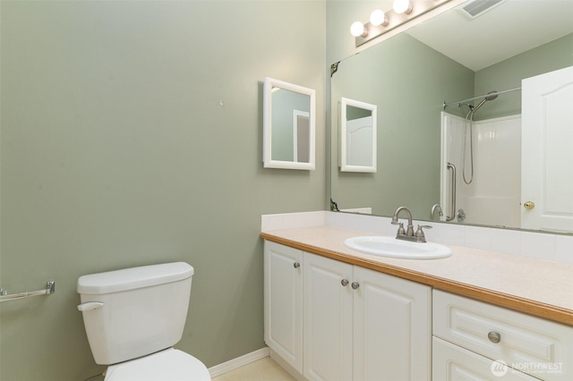 full bathroom with visible vents, vanity, toilet, and baseboards