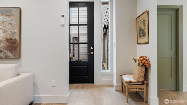 entrance foyer with light hardwood / wood-style floors