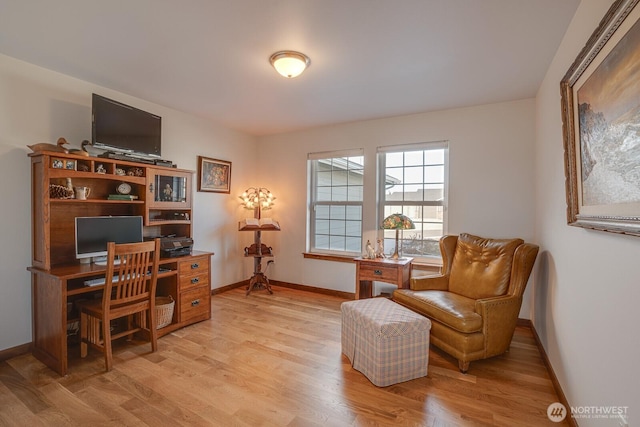 office space with light hardwood / wood-style floors