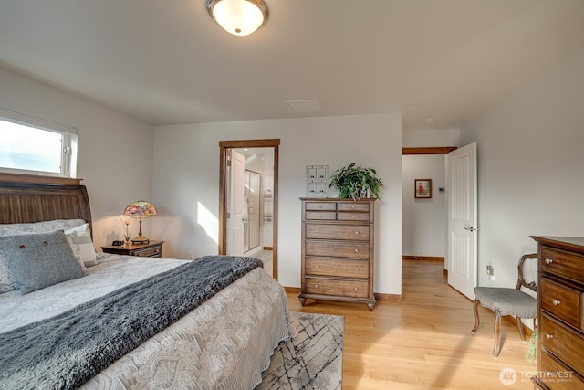 bedroom with light wood-type flooring