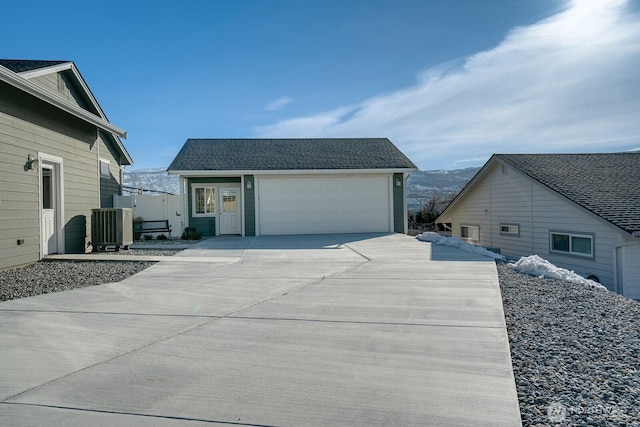 exterior space with a mountain view and cooling unit