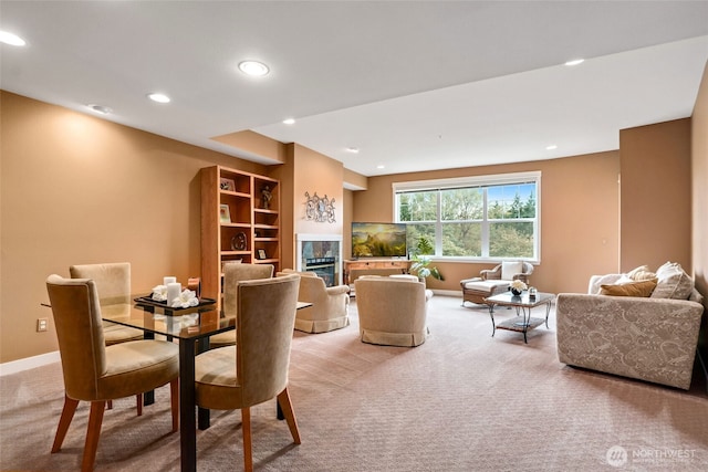 view of carpeted dining space