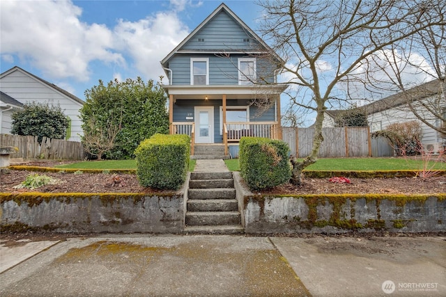 view of front of property featuring covered porch