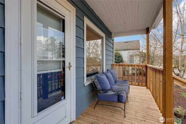 balcony featuring a porch