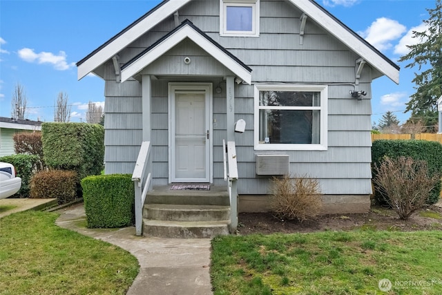 view of front facade with a front lawn