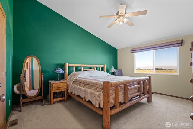 bedroom featuring lofted ceiling, light carpet, visible vents, a ceiling fan, and baseboards