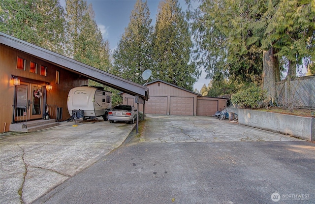 garage with a carport