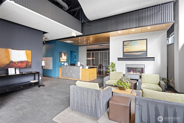 reception area featuring a glass covered fireplace