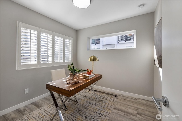 office with hardwood / wood-style floors