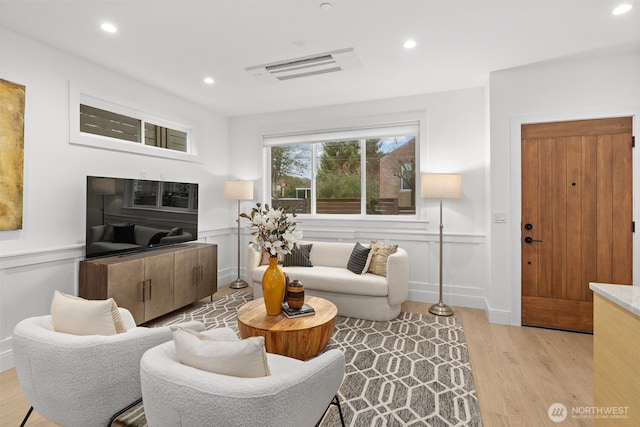 living room featuring light wood-type flooring