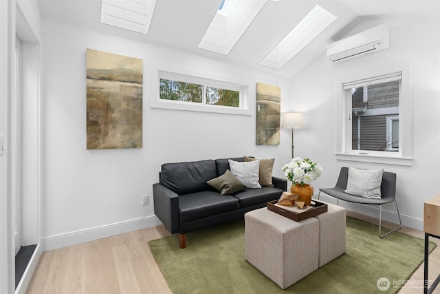 living room featuring wood-type flooring, lofted ceiling with skylight, and a wall mounted AC