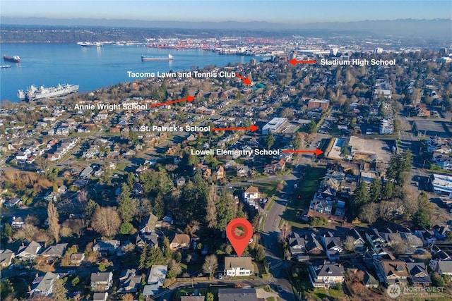 aerial overview of property's location with a nearby body of water