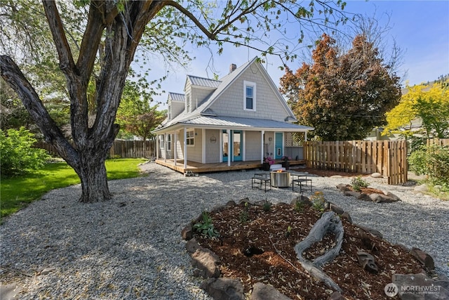 205 S Division, Cashmere, WA 98815 - rear view of property with a porch, metal roof, a standing seam roof, and a chimney