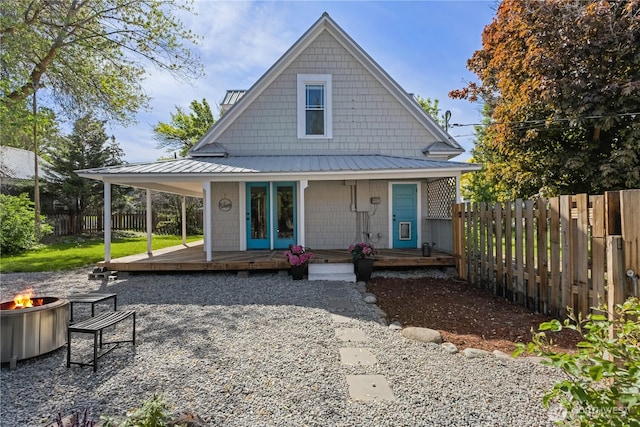 205 S Division, Cashmere, WA 98815 - country-style home featuring a fire pit, a fenced backyard, metal roof, and a wooden deck