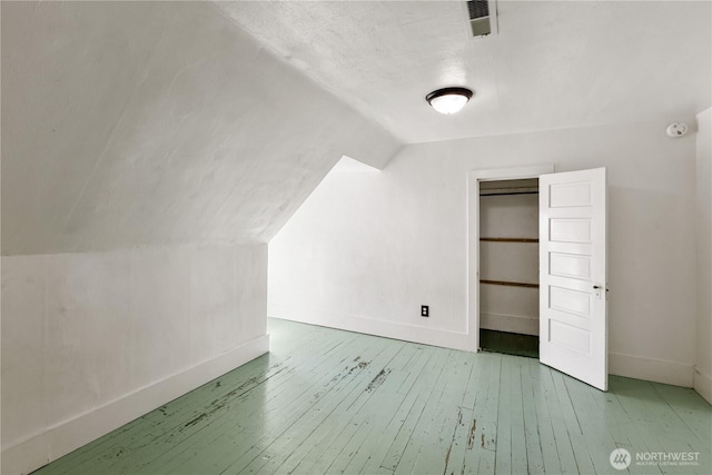205 S Division, Cashmere, WA 98815 - bonus room with baseboards, lofted ceiling, and hardwood / wood-style flooring