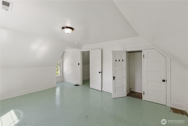 205 S Division, Cashmere, WA 98815 - additional living space with vaulted ceiling, wood finished floors, and baseboards