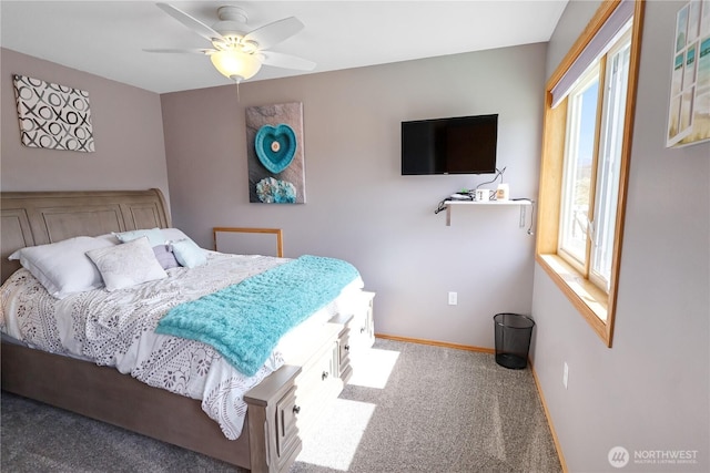 bedroom featuring carpet flooring, baseboards, and ceiling fan