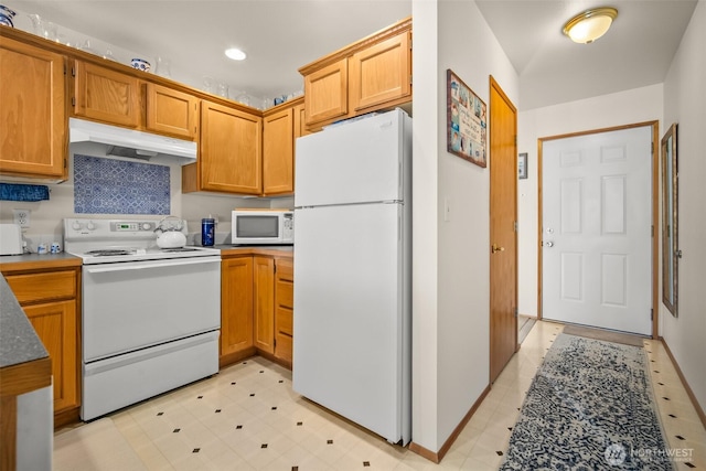 kitchen featuring white appliances